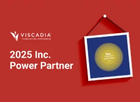 A framed Inc. Power Partner 2025 award hangs on a red wall next to the Viscadia logo and the text "2025 Inc. Power Partner.