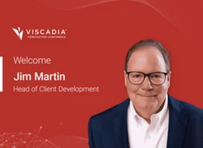 A man in glasses and a suit jacket is shown on a red background with the text "Welcome Jim Martin, Head of Client Development" and the Viscadia logo.