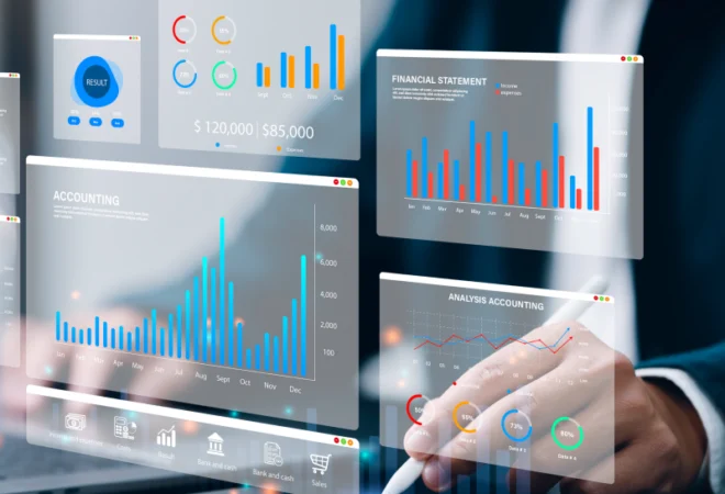Person using a stylus on a tablet with floating digital graphs and financial data dashboards displayed in front of them.